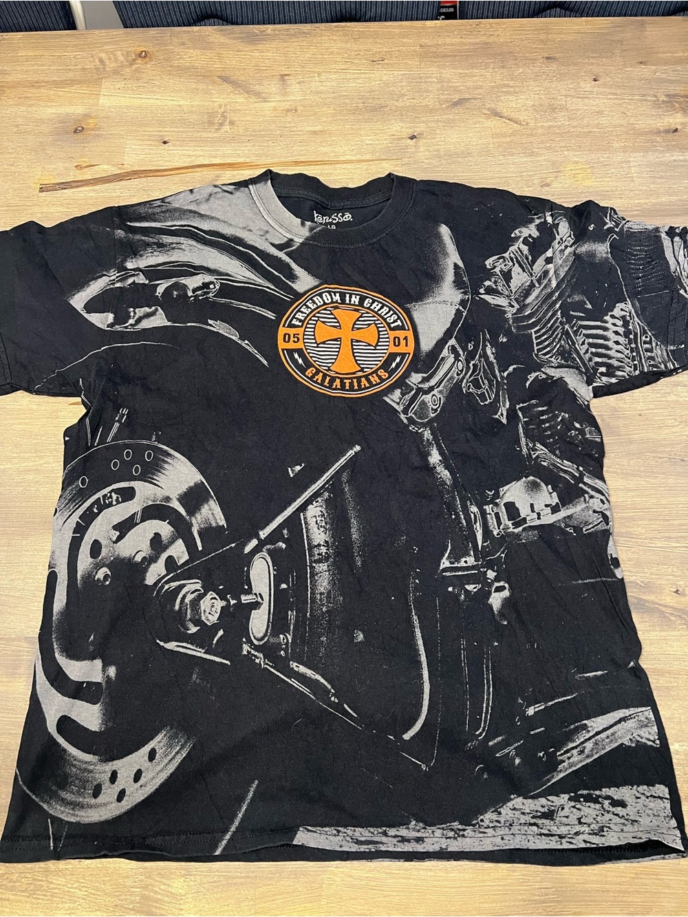 Men's Black Short Sleeve Graphic Tee with Orange Crest
